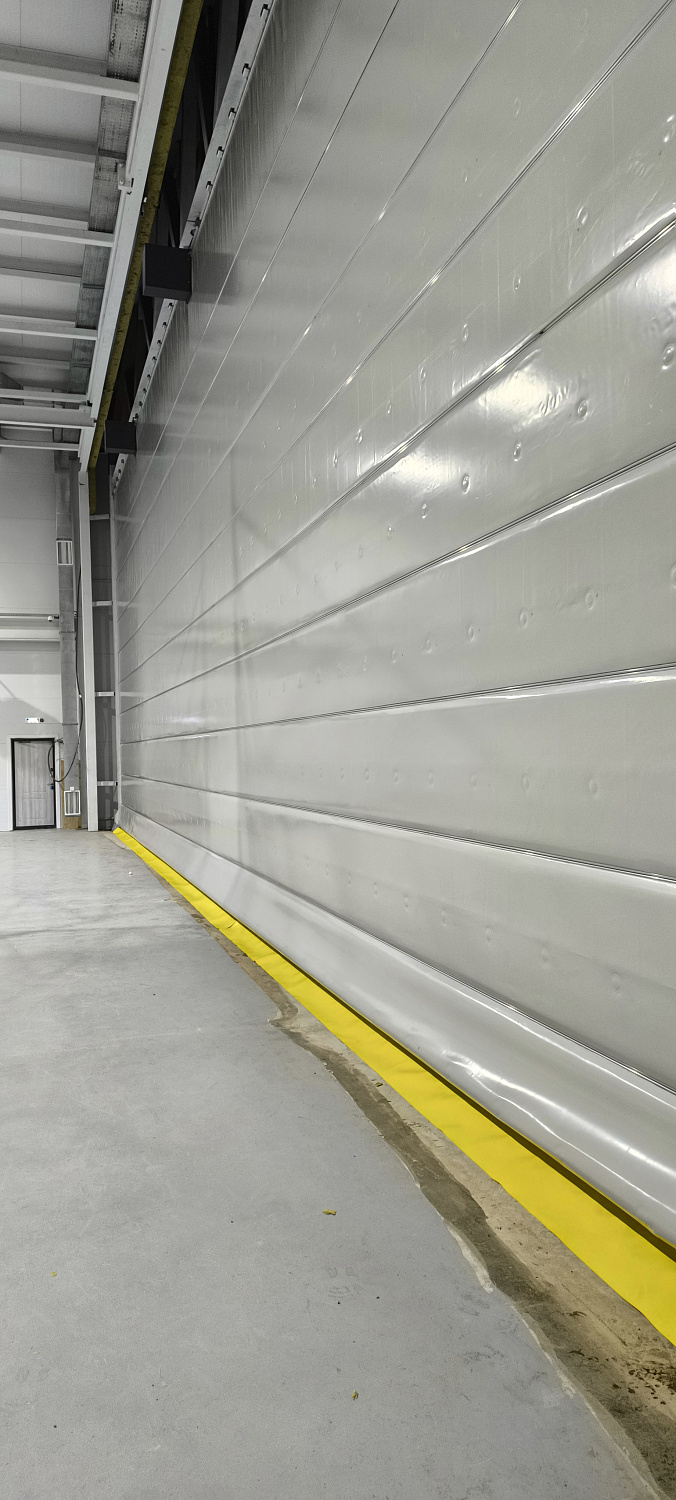 Etalon Group установил ангарные ворота Champion Door для вертолёта МЧС в Жезказгане