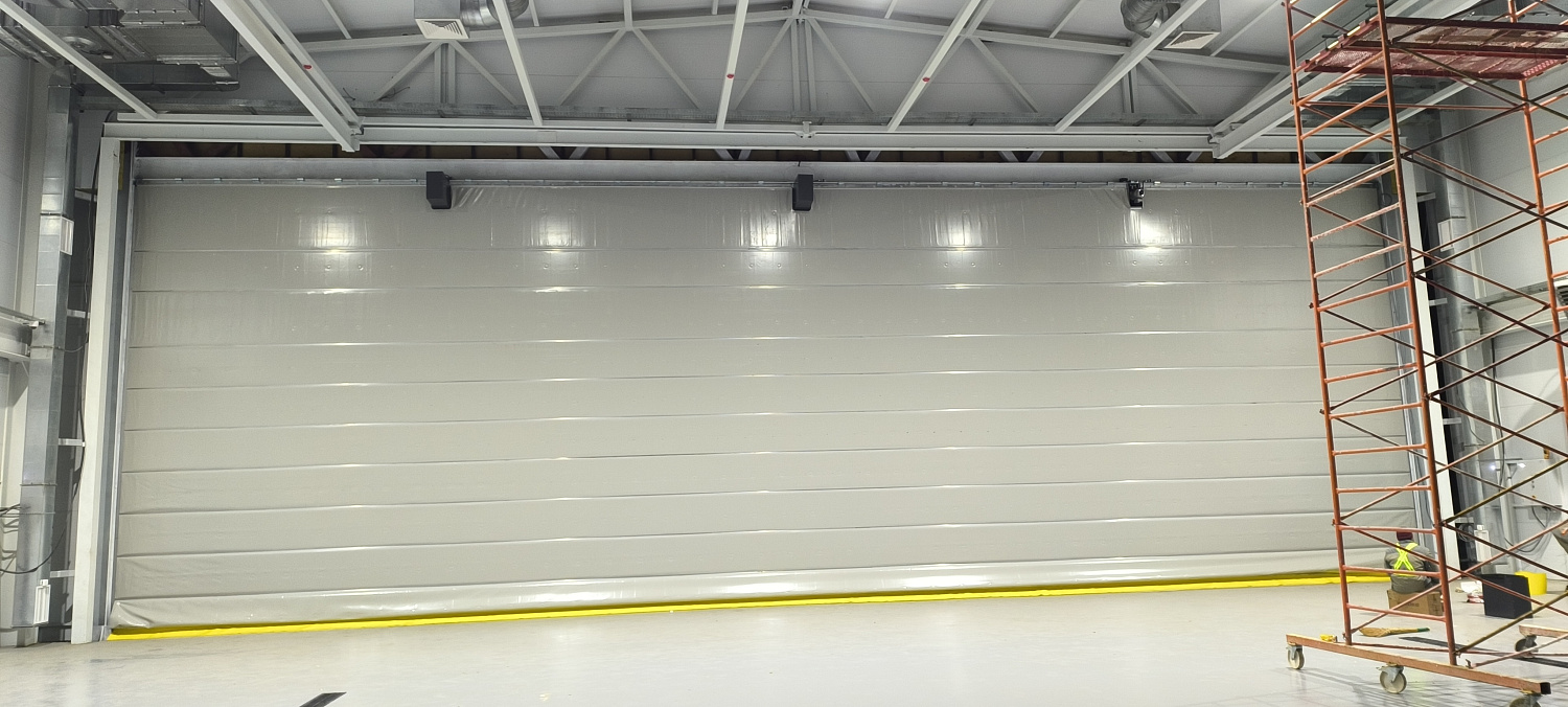 Etalon Group установил ангарные ворота Champion Door для вертолёта МЧС в Жезказгане